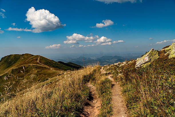 Hiking trail overlooking the mountain peaks of the hills.