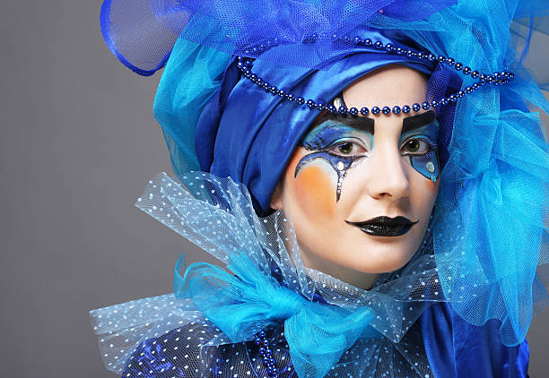 Beautiful lady with artistic make-up. Doll style. Close up.