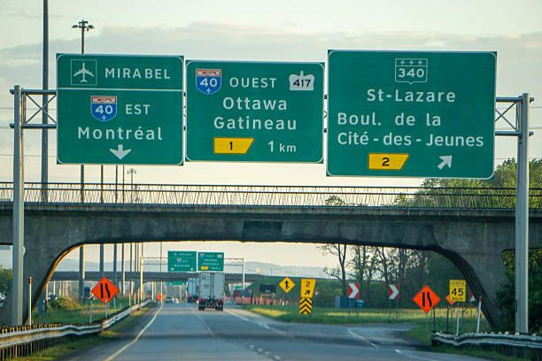 highway signs on the way to montreal canada inside canada