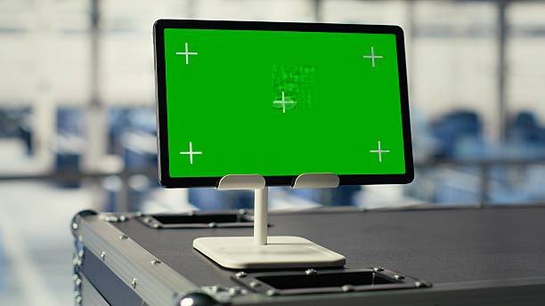 istock Close up of green screen mockup tablet in server hub 2251914509