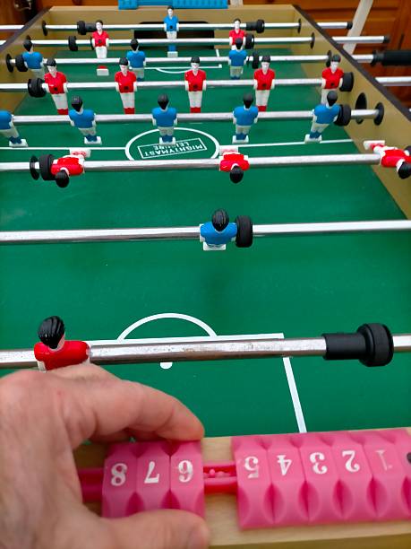 istock Playing table football at home. 2251916353