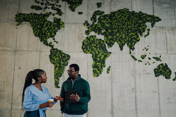 istock Business colleagues discussing sustainability in modern office 2251918553