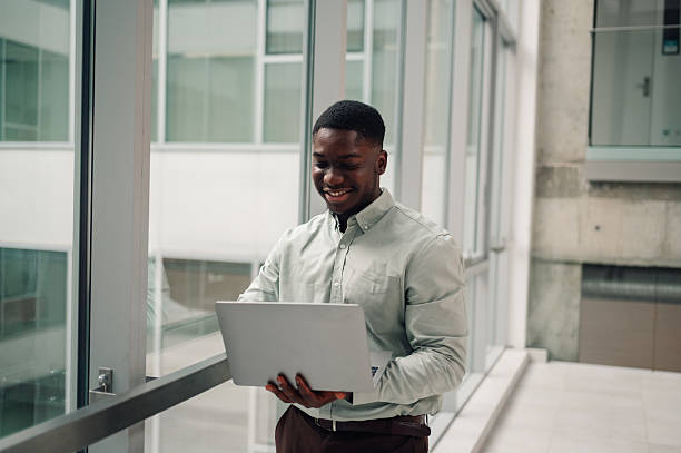 istock African american man using laptop in office 2251918669