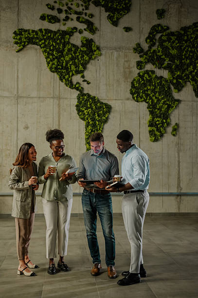 istock Business team discussing work using digital tablet in eco office 2251918850