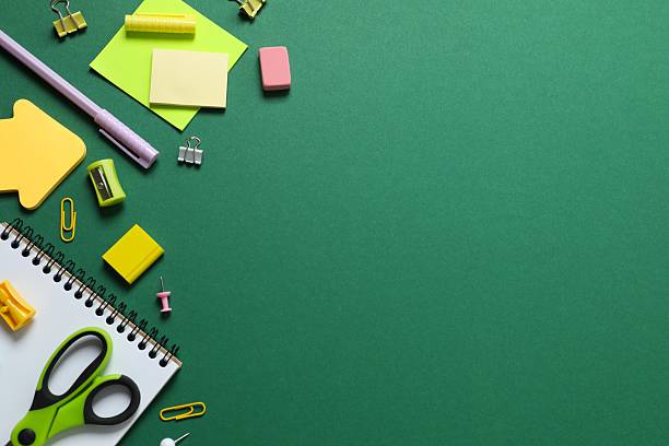 istock Various colorful school supplies with notebook placed neatly on color background 2251919297