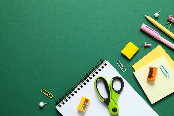 istock Various colorful school supplies with notebook placed neatly on color background 2251919301