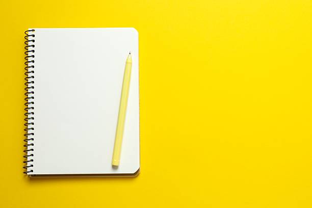 istock Flat lay with pen and notebook on color background, top view 2251919316