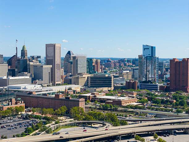 istock Baltimore city skyline with skyscrapers and highways. 2251920307