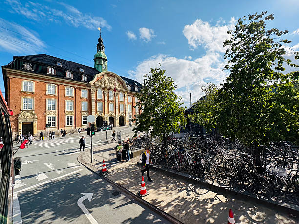 copenhagen, denmark - July 24 2023: The luxury hotel Villa Copenhagen stands beautifully in an old building with a charming square and visitors enjoying the area