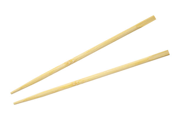 istock wooden bamboo chopsticks isolated on white background 2251920929