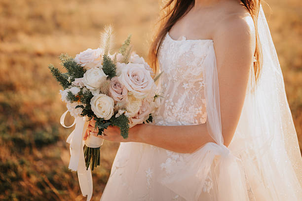 istock Bride holding a beautiful bouquet 2251921451