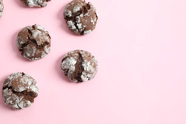 istock Delicious brownie cookies on color background 2251923251