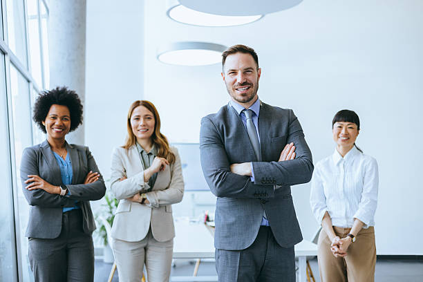 istock Confident male executive with his team 2251924466