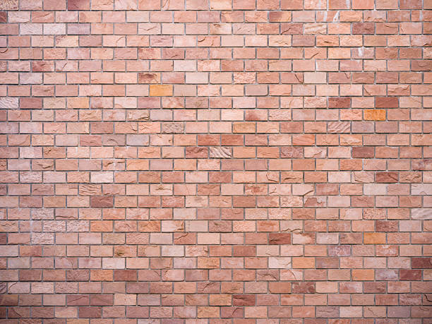 istock texture of Varied pink-brown brick wall 2251927175