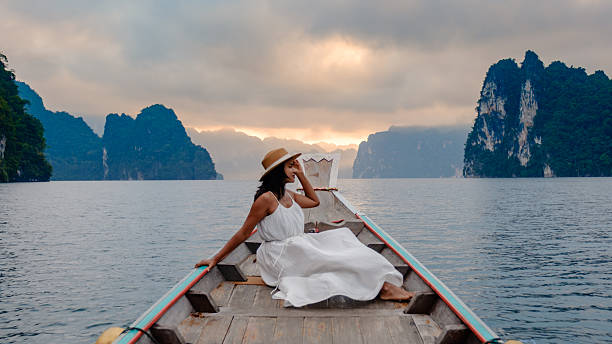 istock Discovering tranquility on Cheow Lan Lake in Khao Sok Thailand at sunset 2251927537