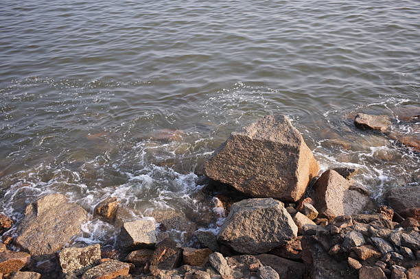 rocks and small waves, close shoreline
