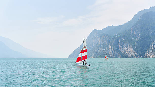 Malcesine, Italy – August 14, 2025: Catamaran on Lake Garda in Italy between Limone sul Garda and Malcesine