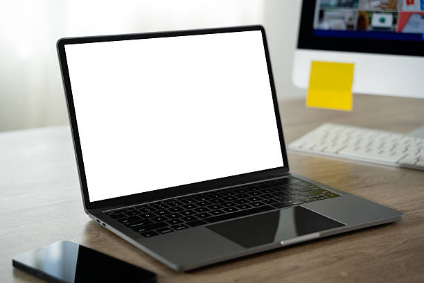 Laptop with blank screen on table. on laptop computer with blank copy space screen for your advertising text message on table