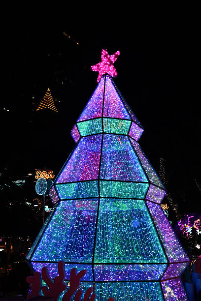istock Colorful Illuminated Christmas Tree at Night 2251941336
