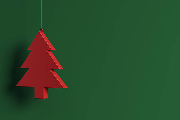 Red Christmas tree shape hanging on green wall, minimal graphic style, blank background. Concept of Christmas, New Year, clean mockup design. 3D Rendering.