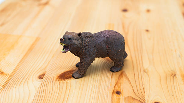 istock Dynamic bear figurine wooden surface cute home decor playful environment creative angle 2251943003