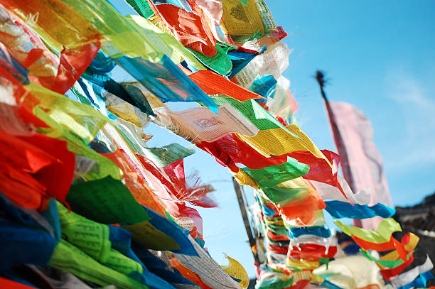 istock Colorful Prayer Flags in Bright Blue Sky 2251944693