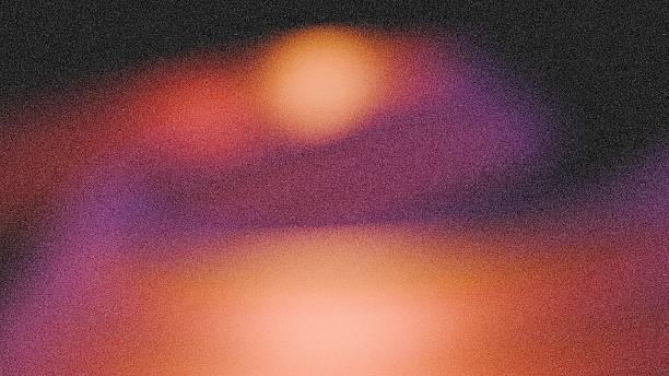 istock dark orange on dark background for poster header, in a grainy gradient glowing color 2251945963