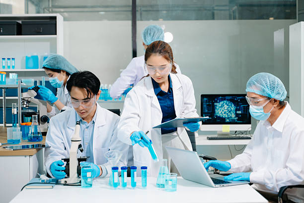 istock A scientific research team collaborating in a modern laboratory, conducting experiments, analyzing samples, and using advanced lab equipment 2251946186
