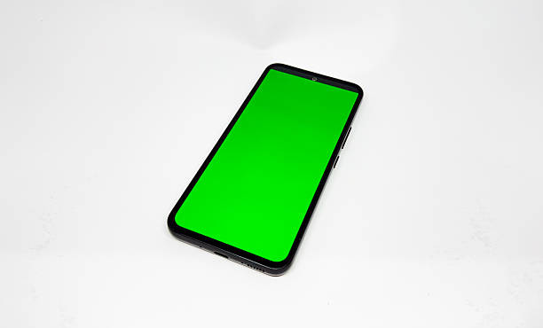 istock mobile phone with green screen for social media mockup for graphic design needs 2251947240