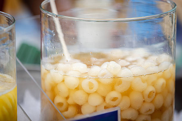 Fresh fruit juice on street food market stand.