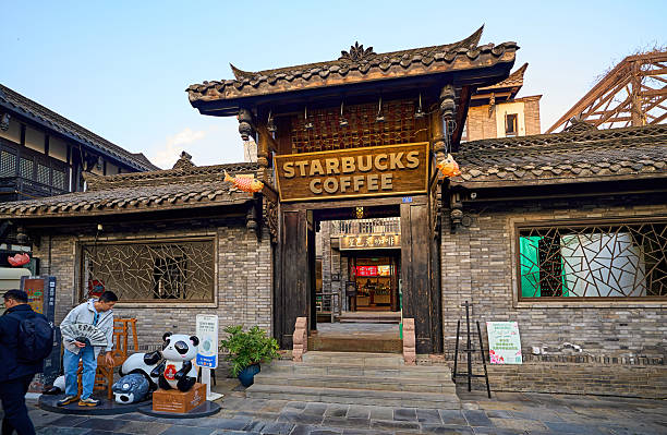Chengdu, sichuan, china - dec 04, 2025: starbucks entrance integrating with ancient buildings in kuanzhai alley, chengdu
