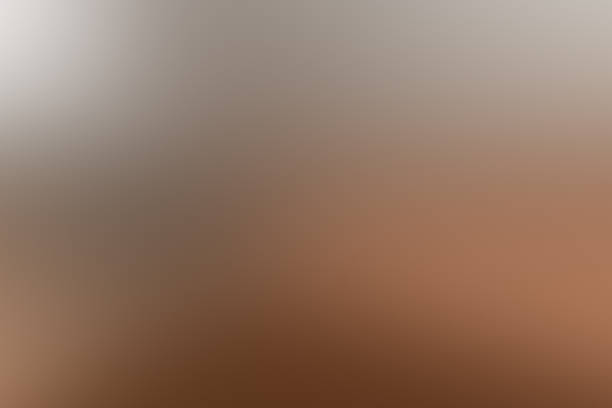 istock Soft abstract gradient background with warm beige and brown tones. Smooth blurred texture creates a calm, elegant atmosphere, perfect for modern design, branding, wellness, beauty, and minimal layouts 2251951871