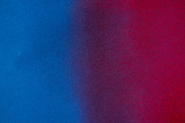 istock Red and blue spray paint background 2251954157