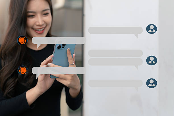 istock Businesswoman uses artificial intelligence chatbots automatically respond online messages to help customers instantly. 2251956973