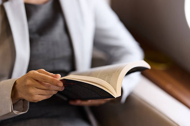 istock Reading a book on a travel! 2251958101