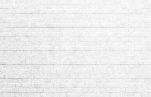 istock Close up modern white brick tiles wall texture background. 2251960341