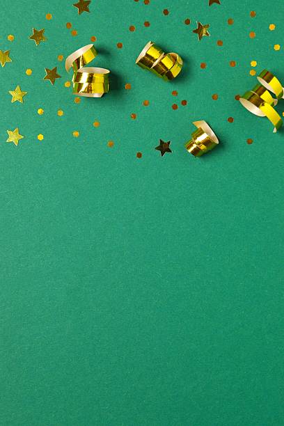 istock Golden confetti on color background, top view 2251967974