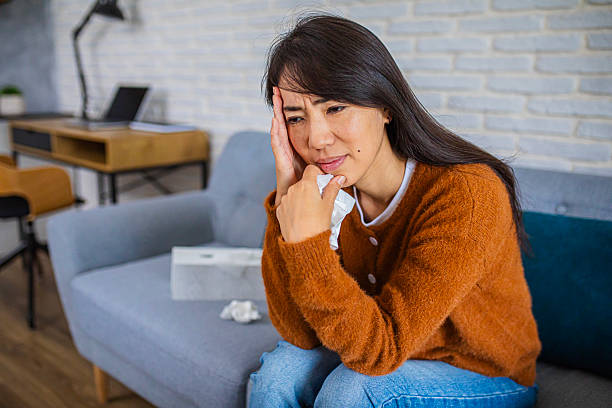 istock Cold and Flu Concept with Sick Woman at Home 2251969243