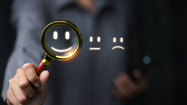 istock Customer Satisfaction Choice with Magnifying Glass and Smiley Face 2251978193