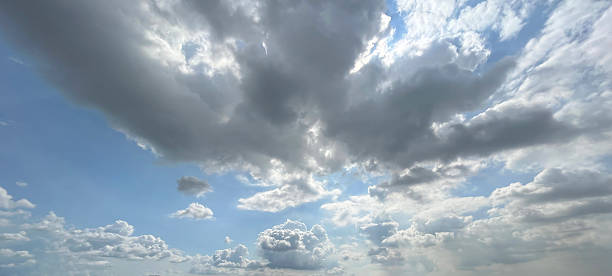 istock Sky view of white cloud. Sun shining through the soft puffy clouds. 2251983448