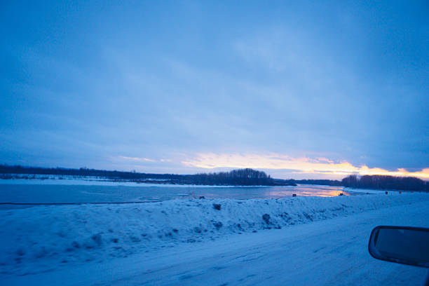 Sunset in Rovaniemi, Lapland, Finland, Kemijoki River in January