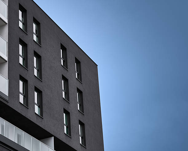 istock Modern residential building facade with blue sky copy space 2251986762