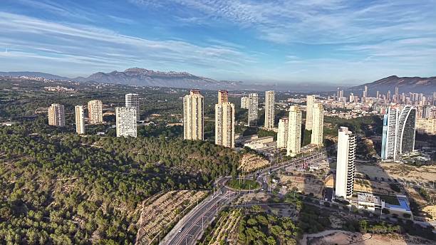 istock Cityscape At Dawn, High Altitude Perspective Capturing City Structures And Natural Surroundings 2251994145