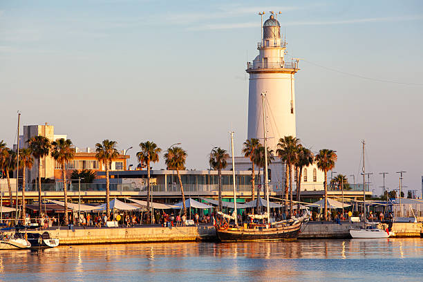 istock Lighthouse near the lively maritime walkway 2251995712