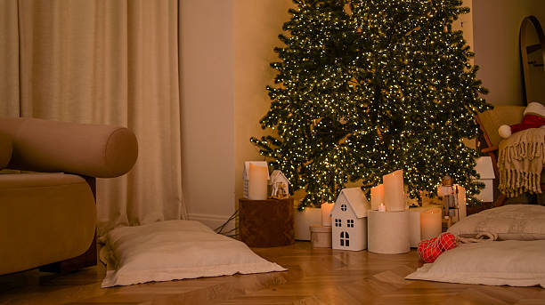 istock Cozy Christmas living room with decorated tree, fireplace, and comfortable seating 2251998836