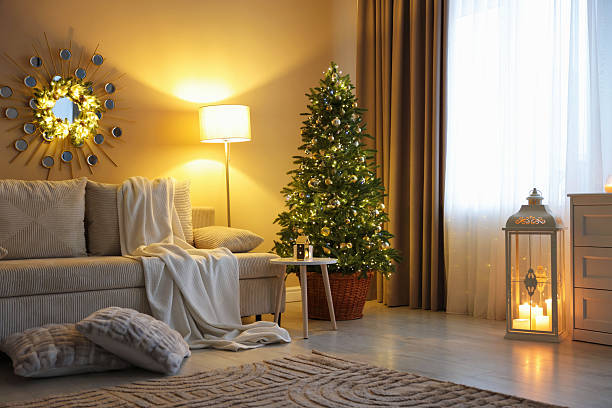 istock Beautiful Christmas tree and other decor in cozy room. Festive interior design 2252000531