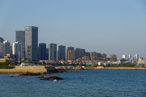 istock Distant Coastal City Across Blue Harbor Water 2252001734