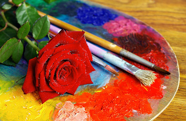 istock red rose brush and palette 2252001851
