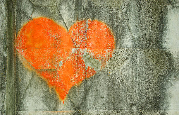 istock old concrete texture background. heart is a love symbol painted on a concrete wall. 2252001866