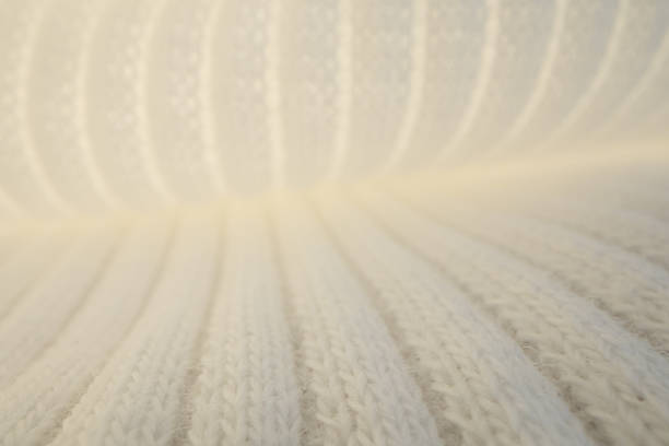 Macro Texture of Ribbed Knit Fabric. grey 11-4201.